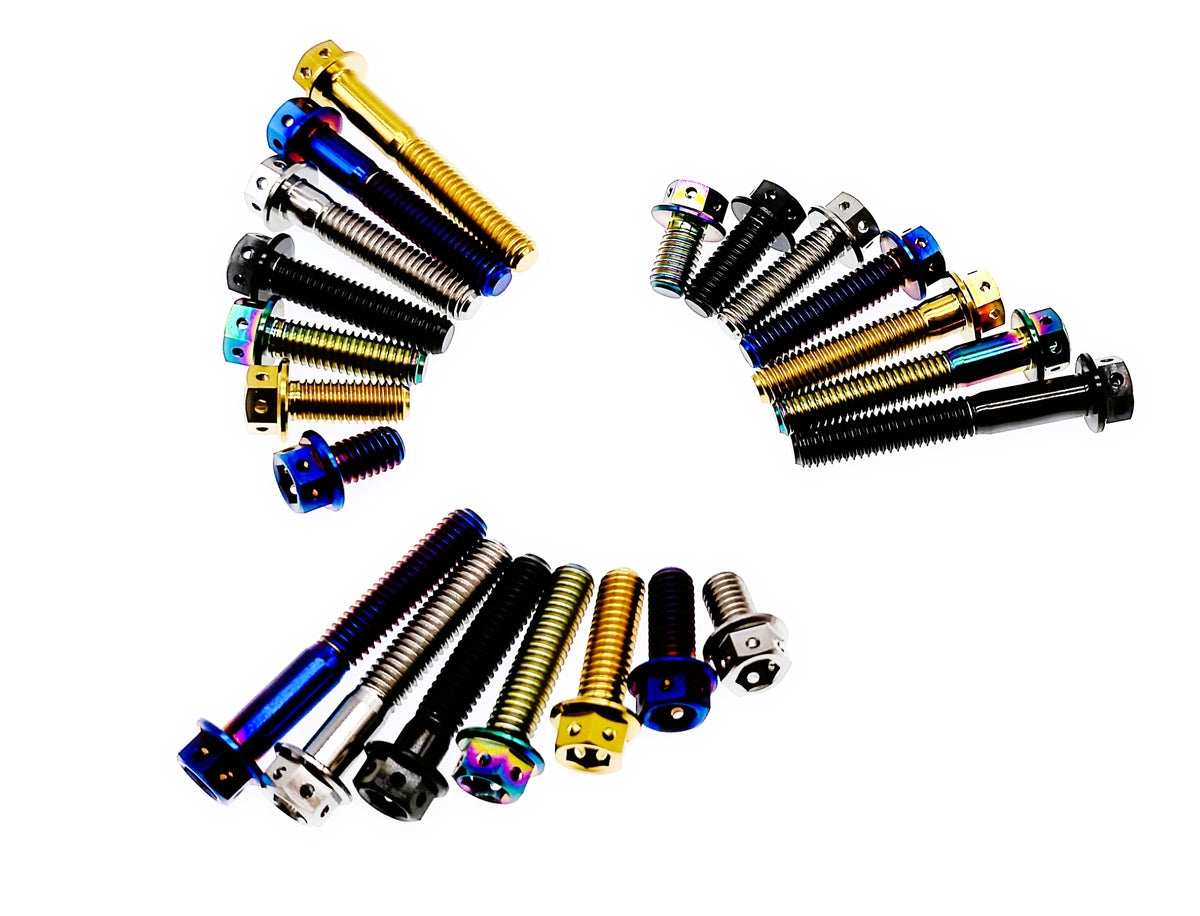 Titanium M10 drilled flange hex head bolts grouped in three fans of mixed anodized colors