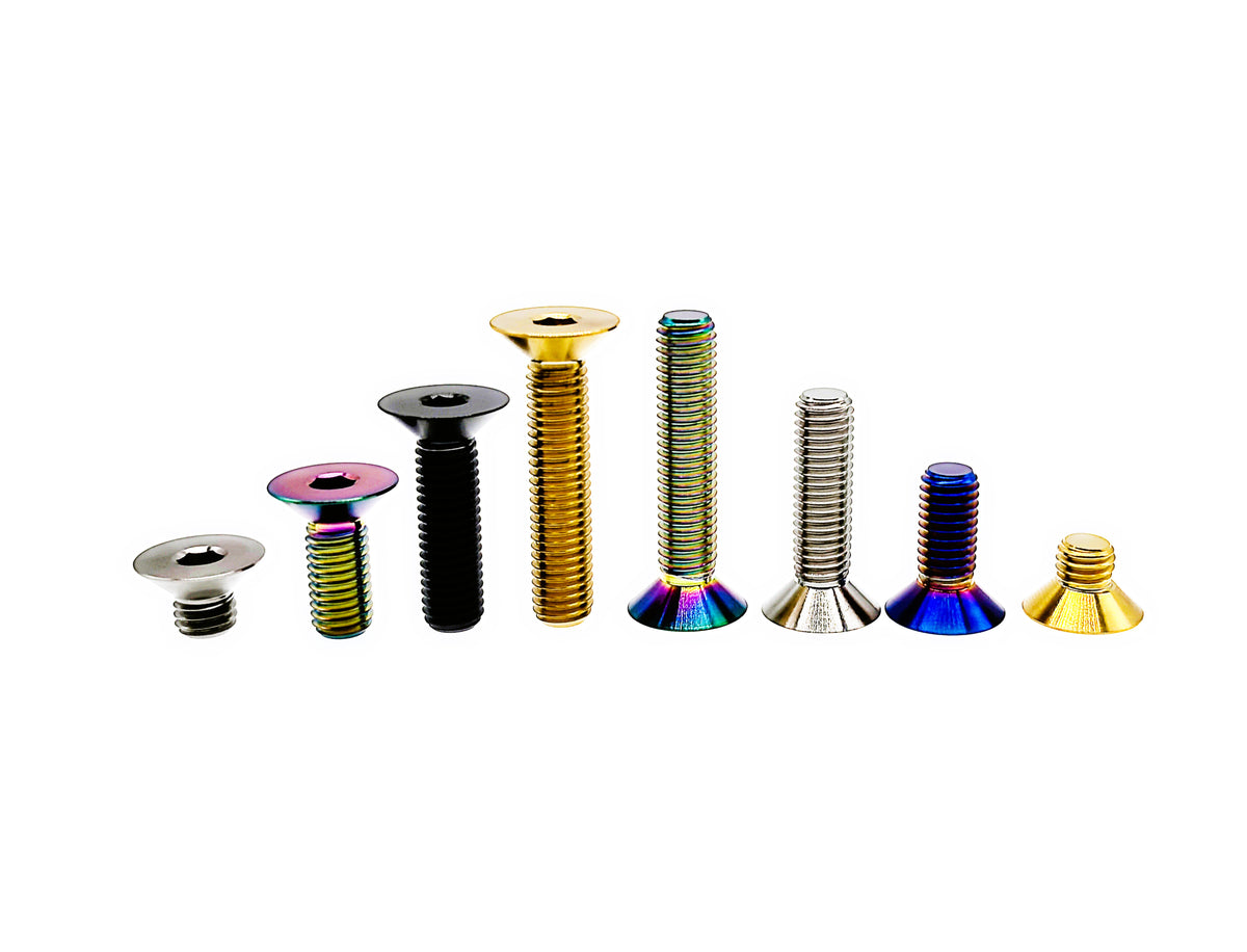 Anodized titanium M5 countersunk hex socket bolts in ascending lengths