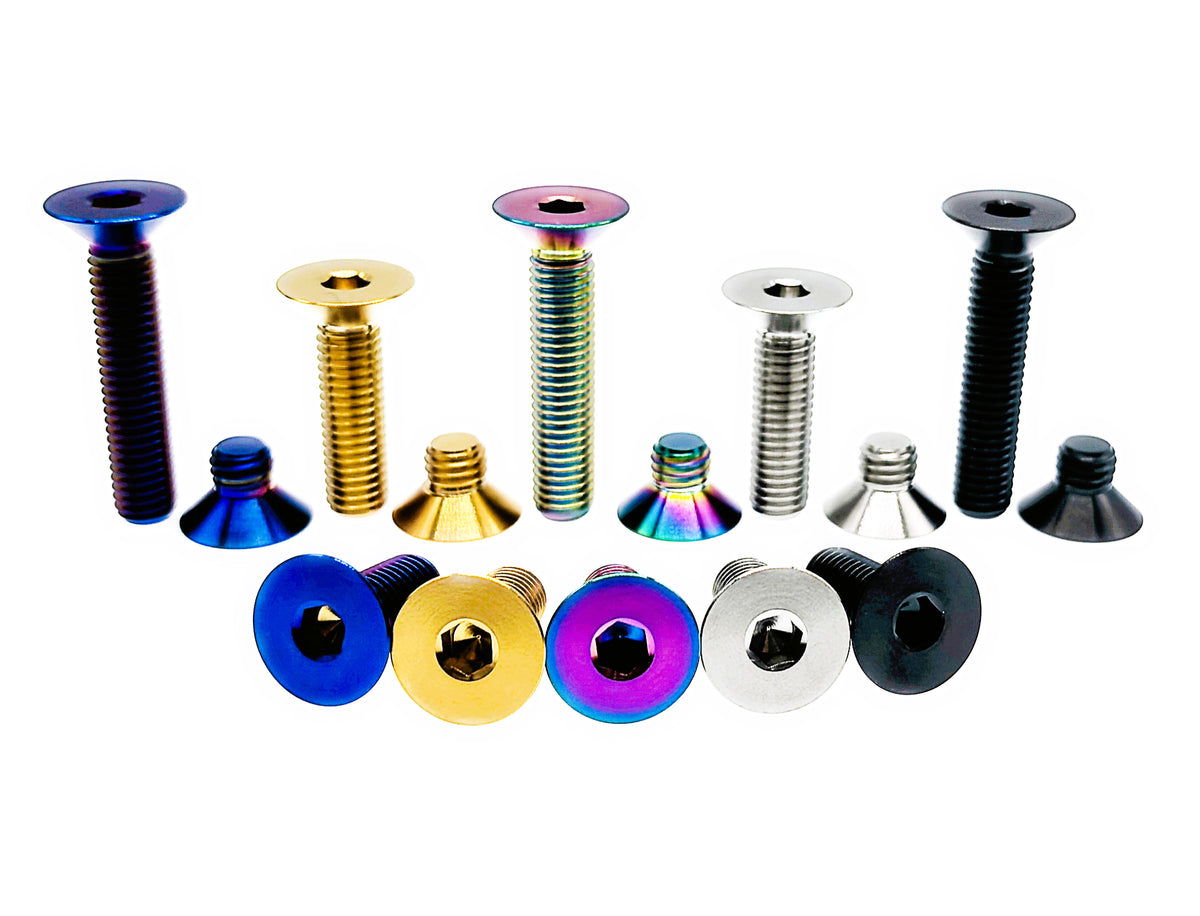 Titanium M5 DIN7991 countersunk hex socket bolts in five finishes, head and side views